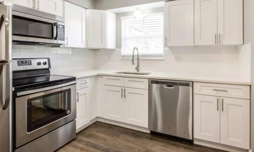 Well-lit kitchen with ample counter space